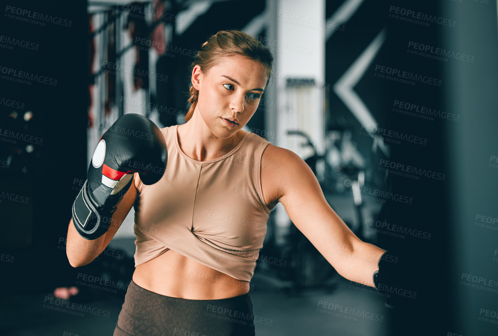 Buy stock photo Fitness, sports and boxing with woman in gym for training, workout and mma challenge. Performance, energy and power with girl boxer and focus for fight, wellness and exercise in martial arts class