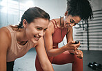 Fitness, smile and girl with a personal trainer for training, exercise time and performance monitor. Motivation, happy and friends helping with a gym workout and reading cardio results on stopwatch