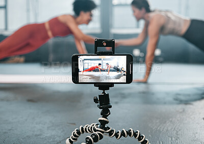 Buy stock photo Influencer, phone and fitness people recording, filming or broadcast online training video, exercise tutorial or guide. Sports, handshake and athlete team, women of friends live streaming gym workout