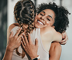 Happy, friends and hug with women in gym for for fitness, exercise and workout. Well done, congratulations and support with girl athlete training together for sports, mindset and wellness motivation