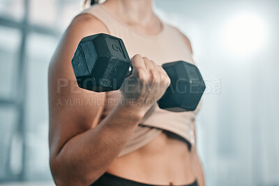 Athletic woman doing exercise for arms. Photo of muscular fitness