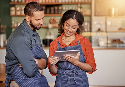 Buy stock photo Restaurant, cafe teamwork and couple with tablet to manage orders, inventory and stock check. Diversity, waiter technology and man and woman with digital touchscreen for managing sales in coffee shop