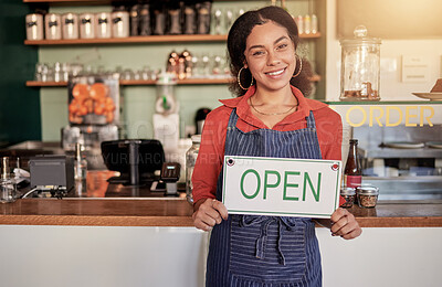 Buy stock photo Small business, portrait or black woman with an open sign to welcome sales in cafe or coffee shop. Marketing, female manager or happy entrepreneur smiles while advertising or opening a retail store