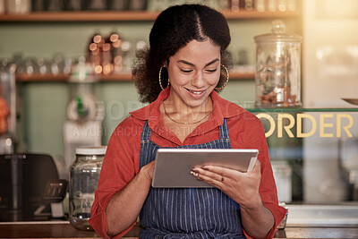 Buy stock photo Small business, cafe barista and woman with tablet to manage orders, inventory and stock check. Coffee shop waiter, technology and happy young female waitress with touchscreen for managing sales.