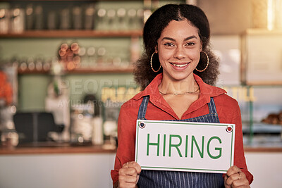Buy stock photo Portrait, small business or black woman with hiring sign for onboarding in a cafe or coffee shop with hospitality.  Restaurant manager with a happy smile with recruitment message after opening store