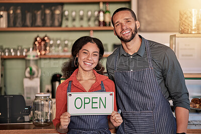 Buy stock photo Portrait, small business or couple with open sign to welcome sales in a cafe or coffee shop with hospitality.  Restaurant or managers with a happy smile with message on board after opening a store