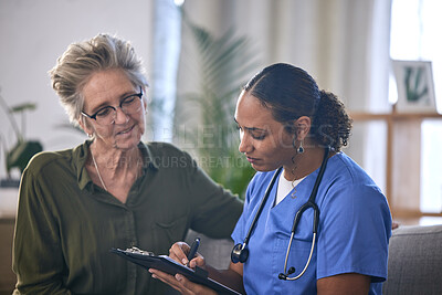 Buy stock photo Medical, retirement and clipboard with a nurse and woman in consultation over treatment in a home. Healthcare, insurance and documents with a female medicine professional taking to a mature patient