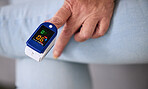 Medical, heart rate and woman with a pulse oximeter in a retirement home during consultation. Healthcare, treatment and senior female patient measuring her oxygen blood levels with health device.