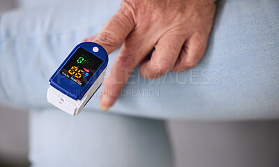 Medical, heart rate and woman with a pulse oximeter in a retirement home during consultation. Healthcare, treatment and senior female patient measuring her oxygen blood levels with health device.