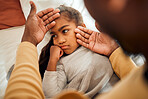 Sick, girl and father checking high temperature with hands on ill kid or daughter lying on a bed feeling sad. Concern, care and parent in bedroom with worried child with flu, cold or fever