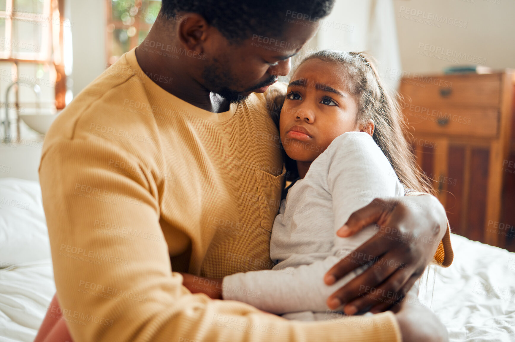 Buy stock photo Sick, sad and father holding his child with an illness, pain or problem in her bedroom at their home. Ill, care and African dad holding his girl kid with concern while she has the flu, cold or fever.