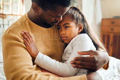 Buy stock photo Sick, illness and father with his child with pain, sad or problem in her bedroom at their home. Ill, care and African dad holding his girl kid with concern while she has the flu, cold or fever.