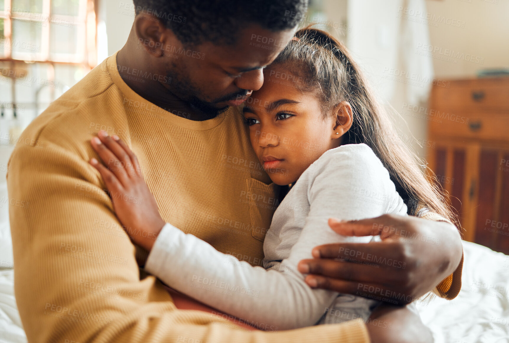 Buy stock photo Sick, illness and father with his child with pain, sad or problem in her bedroom at their home. Ill, care and African dad holding his girl kid with concern while she has the flu, cold or fever.