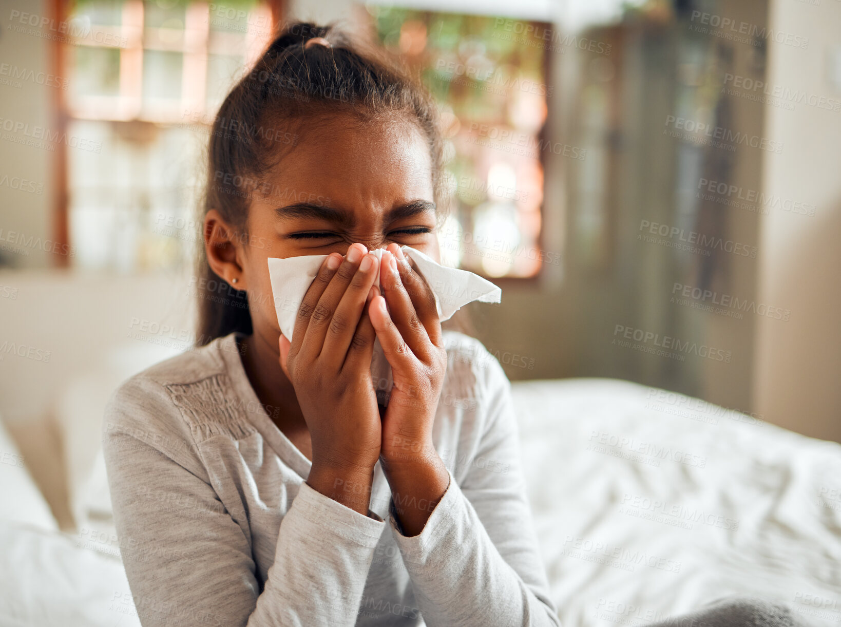 Buy stock photo Health, covid and sick black girl blowing nose in home bedroom. Wellness, healthcare and kid with tissue to wipe for virus, infection or cold, flu or fever, allergy or corona illness in house alone.