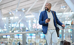 Businessman, phone and luggage at airport for travel, journey or checking flight times or destinations. Happy black man, person or employee holding smartphone for schedule, traveling or work trip