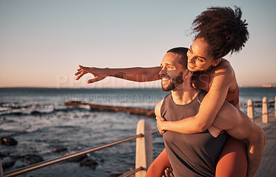 Buy stock photo Fitness, couple and piggyback for beach sunset, travel or fun holiday journey together in the outdoors. Happy man and woman enjoying back ride by the ocean coast after running exercise or workout