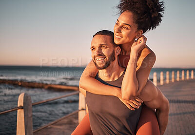 Buy stock photo Beach, sunset and couple piggyback in summer enjoying holiday, vacation and quality time on weekend. Love, dating and black man and woman relax after running, fitness workout and training by ocean