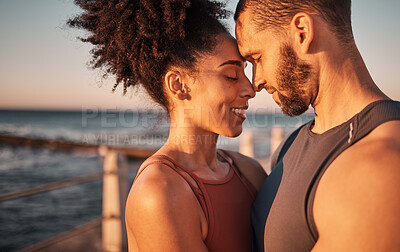 Buy stock photo Black couple, smile and hug with forehead by beach embracing relationship, compassion or love and care. Happy man and woman touching heads smiling in happiness for support, trust or romance in nature