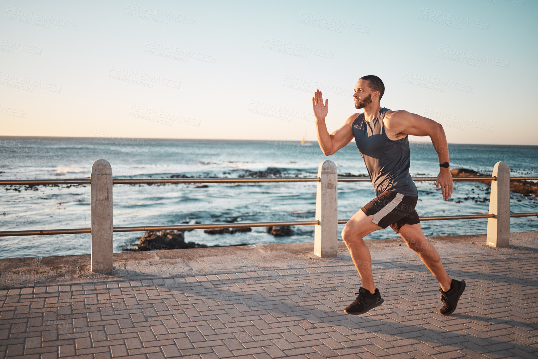 Buy stock photo Running, ocean and mockup with a man runner training outdoor on the promenade for cardio or endurance. Fitness, sea and mock with a sports male taking a run on the coast for health or wellness
