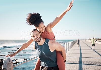 Buy stock photo Beach, fitness and couple piggyback in summer enjoying holiday, vacation and quality time on weekend. Love, dating and black man and woman relax after running, exercise workout and training by ocean