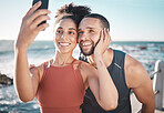 Black couple, fitness and happy selfie on beach for social media, sports exercise and support motivation. Athlete woman, man and happiness together for smartphone photography by ocean sea outdoor