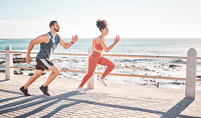 Buy stock photo Runner, fitness and sea with a sports couple outdoor during summer for cardio or endurance exercise. Health, training and ocean with a man and woman running on a promenade for a workout together