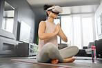 VR, meditation and fitness with a woman using a headset to access the metaverse in her home for health. Virtual reality, yoga and exercise with a young female yogi meditating in her home using 3d ai