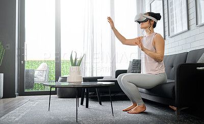Buy stock photo VR, metaverse and futuristic with a woman in the living room of her home using a headset to access a 3d game. Technology, virtual reality and gaming with a female gamer using ai to play games