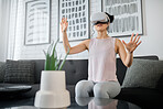 VR, metaverse and technology with a woman in the living room of her home using a headset to access a 3d game. Futuristic, virtual reality and gaming with a female gamer using ai to access games
