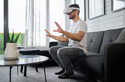 Buy stock photo Virtual reality, futuristic technology and man on sofa with headset for interactive, online and 3d games ux. User interface, digital tech and male relax with vr for metaverse, cyberspace and gaming