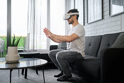 Buy stock photo Virtual reality glasses, metaverse and man on sofa with headset for streaming interactive, online and 3d games. Futuristic tech, user interface and male with vr for digital ux, cyberspace and gaming