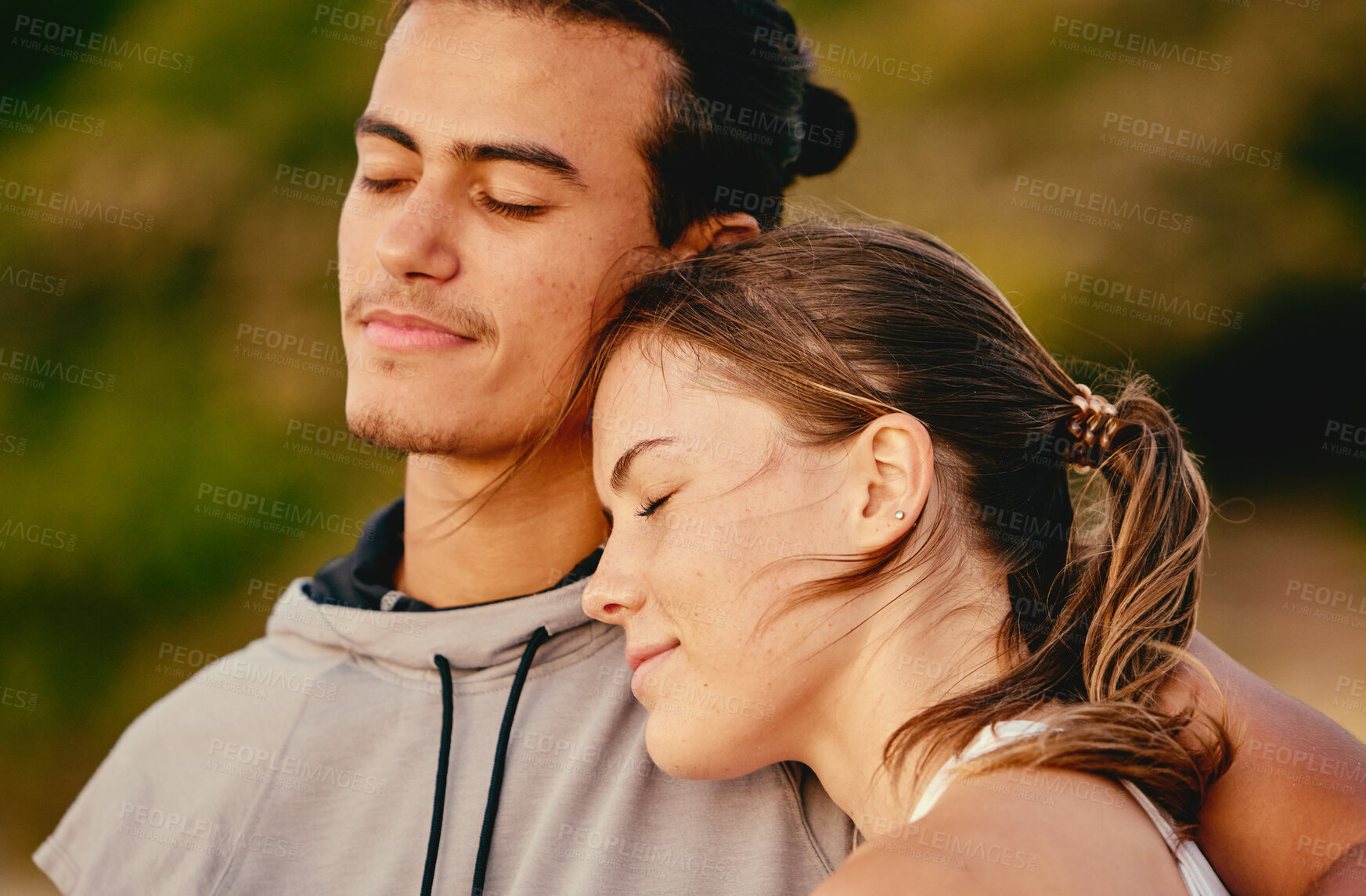 Buy stock photo Couple, smile and hug embracing relationship for real quality bonding time together in the outdoors. Man and woman enjoying calm relaxation in romance, hugging or care in love for fresh air in nature