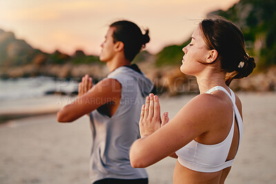 Buy stock photo Yoga couple, prayer hands and meditation at beach
outdoors for health and wellness. Sunset, pilates fitness and man and woman with namaste hand pose for training, calm peace and mindfulness exercise.