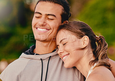 Buy stock photo Happy couple, smile and hug embracing relationship and spending quality time together in the outdoors. Man and woman relaxing and smiling for holiday break, fresh air and satisfaction in nature