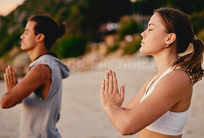 Buy stock photo Meditation, prayer hands and yoga couple at beach outdoors for health and wellness. Zen chakra, pilates fitness and man and woman with namaste hand pose for praying, training and mindfulness exercise