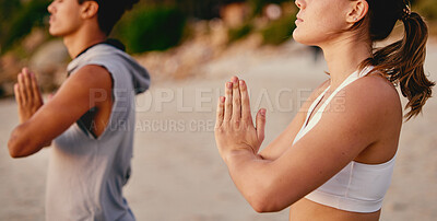 Buy stock photo Meditation, yoga and prayer hands of couple at beach outdoors for health or wellness. Zen chakra, pilates fitness or man and woman with namaste hand pose for praying, training or mindfulness exercise
