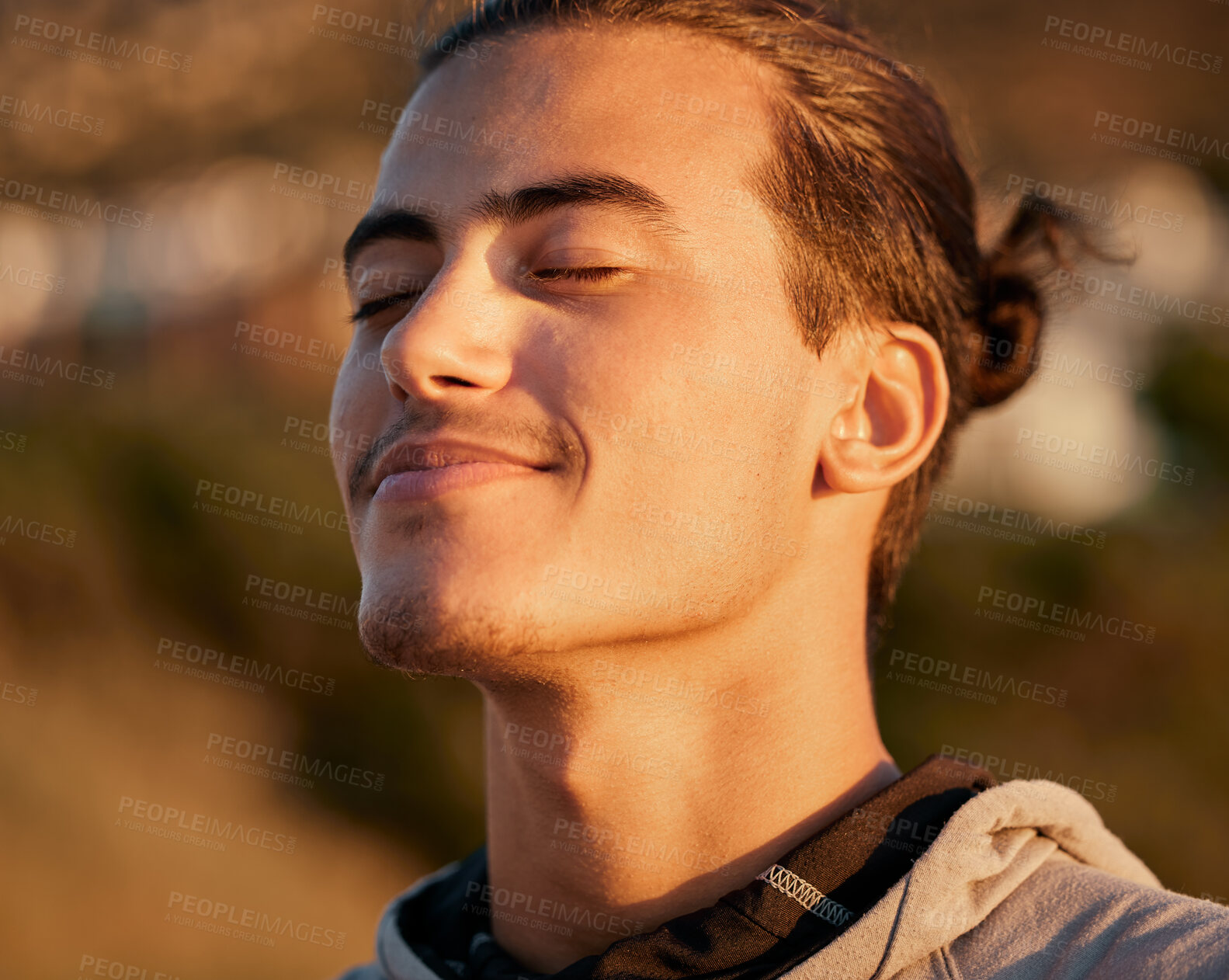 Buy stock photo Man, face and smile breathing fresh air for spiritual wellness, health or satisfaction in the nature outdoors. Happy male, person or guy smiling in happiness for freedom, oxygen or calm peace outside