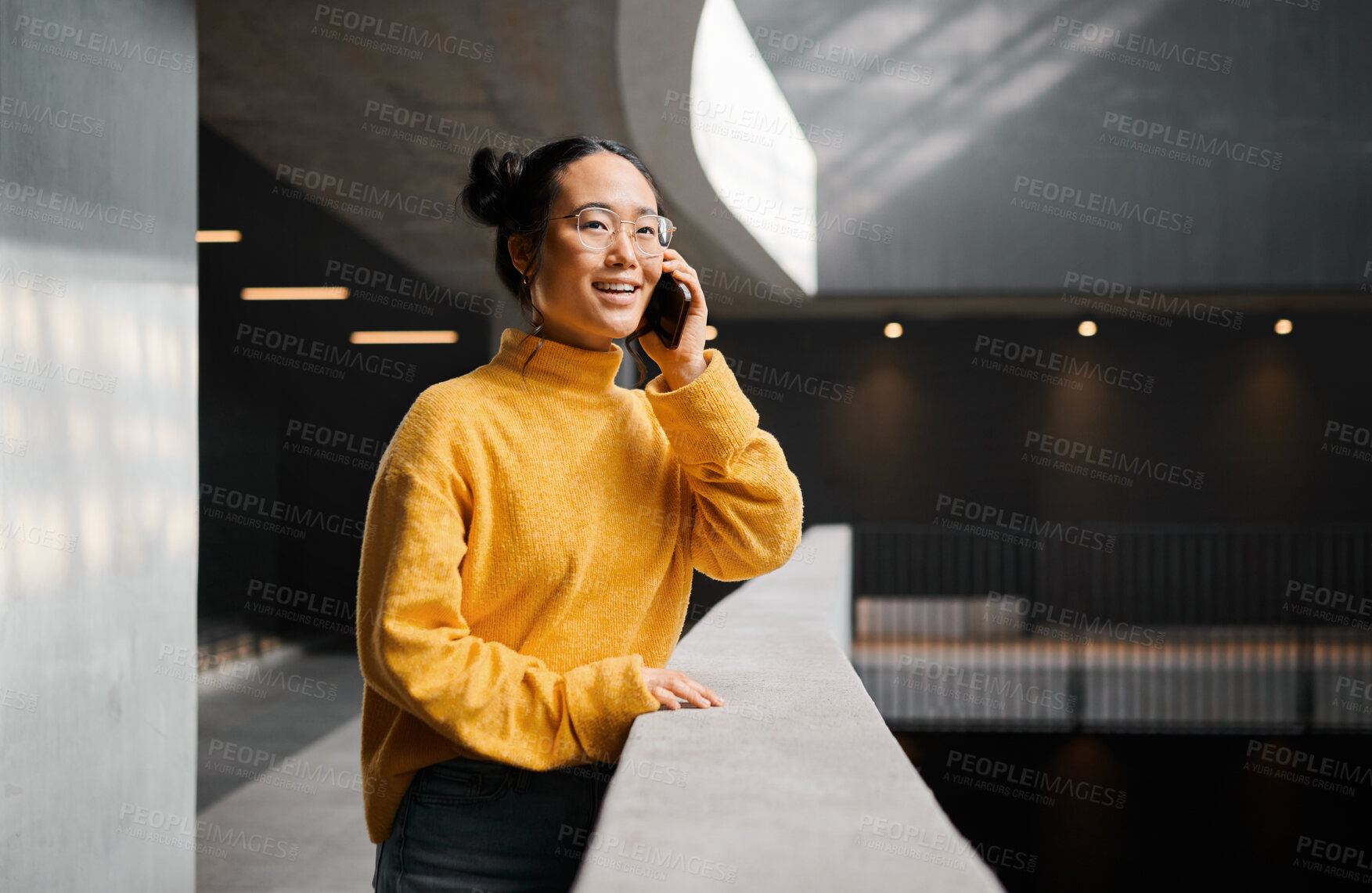 Buy stock photo Phone call, conversation and mockup with an asian woman talking while standing in a hallway. Mobile, networking and communication with an attractive young female speaking on her smartphone indoor