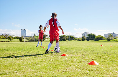 Buy stock photo Soccer, running or sports and a girl team playing with a ball together on a field for practice. Fitness, football and grass with kids training or dribbling on a pitch for competition or exercise