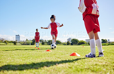 Buy stock photo Soccer, training or running and a girl team playing with a ball together on a field for practice. Fitness, football and grass with sports kids dribbling on a pitch for competition or exercise