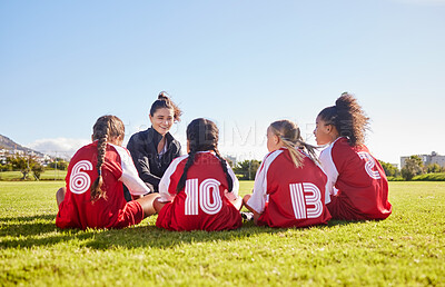 Buy stock photo Team building, planning or coach with children for soccer strategy, training and sports goals in Canada. Sport, friends and woman coaching group of girls on football field for game, match or workout