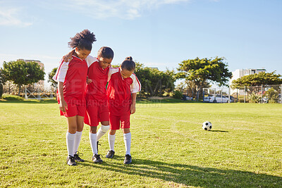Buy stock photo Children, soccer and girl team help, support and walking with injured friend at soccer field. Sports injury, kids and football player group helping, holding and carrying player for football accident