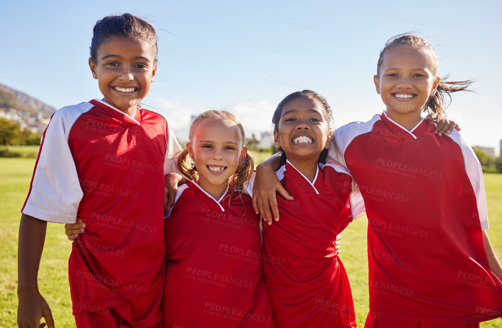 Buy stock photo Girl, soccer group portrait and field with smile, team building happiness and solidarity for sport training. Female kids, sports diversity and happy with friends, teamwork and learning in football