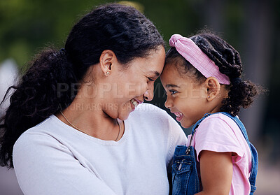 Buy stock photo Mother, daughter and hug in a park, love and sweet while bonding outdoor together. Black woman, girl and touching face in a garden for fun, precious and happy, laugh and relax in moment of motherhood