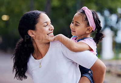 Buy stock photo Woman, girl child and smile for piggyback ride in urban park, street and outdoor for love, bonding or care. Excited family, mother and daughter for riding back, comic laugh and relax on vacation walk