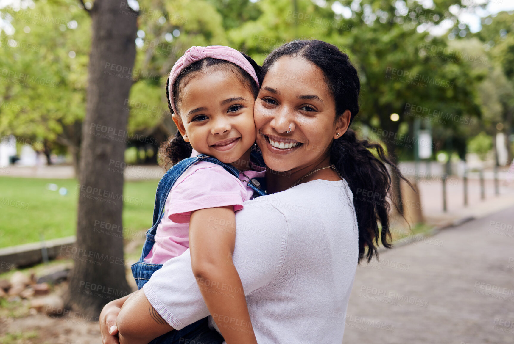 Buy stock photo Portrait, mom and child hug in park, fun day outdoor with love and care, happy people together in nature. Family, happiness and bonding with childhood, woman with girl on adventure with smile