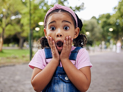 Buy stock photo Wow, surprise and girl child at park outdoors looking shocked. Face portrait, omg and shock of kid from South Africa with surprised facial expression after good news while on holiday or vacation.