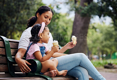 Buy stock photo Summer, garden and ice cream with a mother and daughter bonding together while sitting on a bench outdoor in nature. Black family, children and park with a woman and girl enjoying a sweet snack