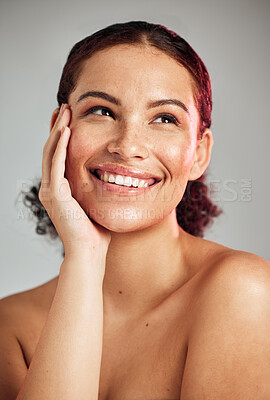 Buy stock photo Skincare, wellness and woman with makeup in studio with cosmetic, beauty or natural face routine. Happy, smile and female model with healthy or self care facial treatment isolated by gray background.