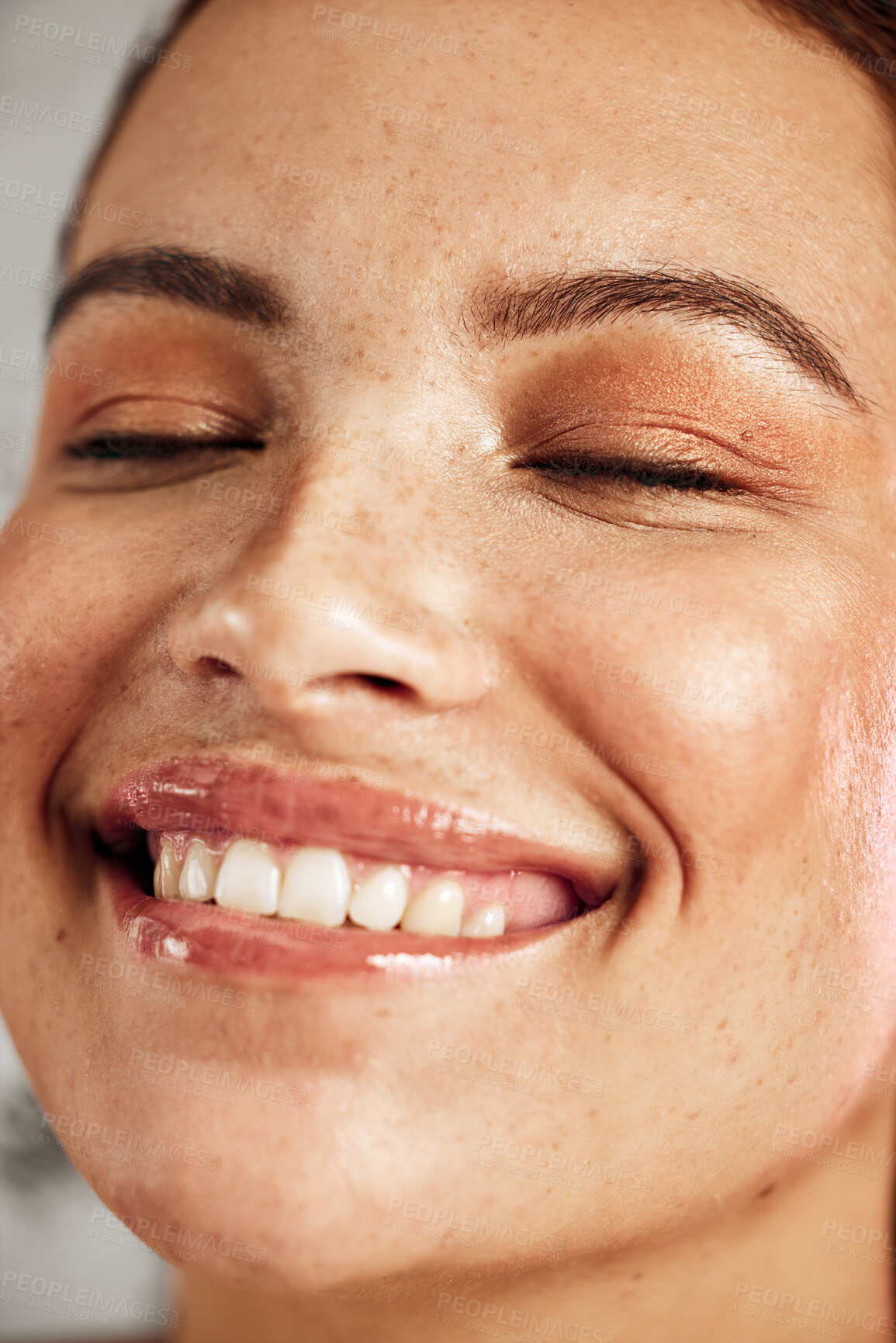 Buy stock photo Face, woman and smile in studio for makeup, skincare and wellness, content and joy or grooming. Happy, beauty and girl model laughing, skin and routine, care and hygiene for soft, smooth and perfect